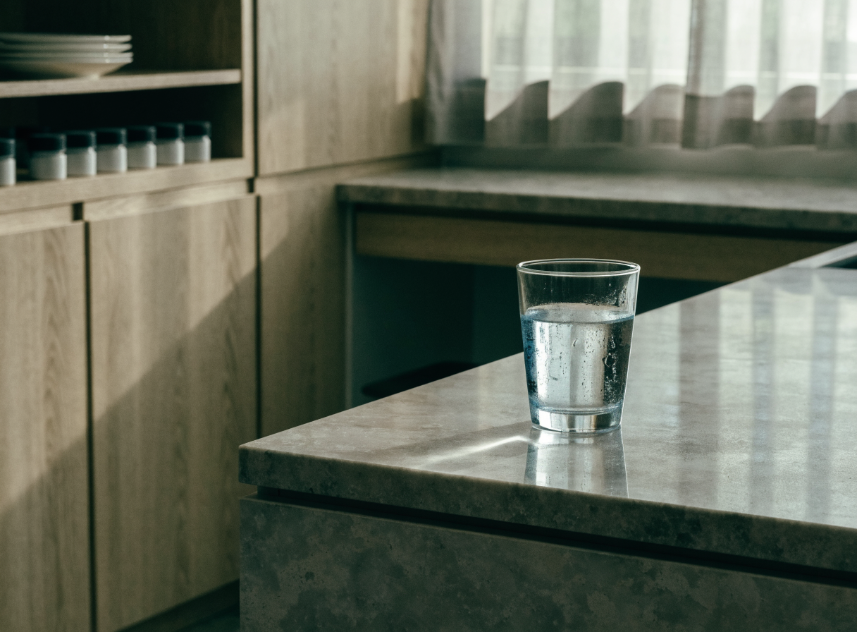 Glass of chilled water on a Saudi office pantry counter